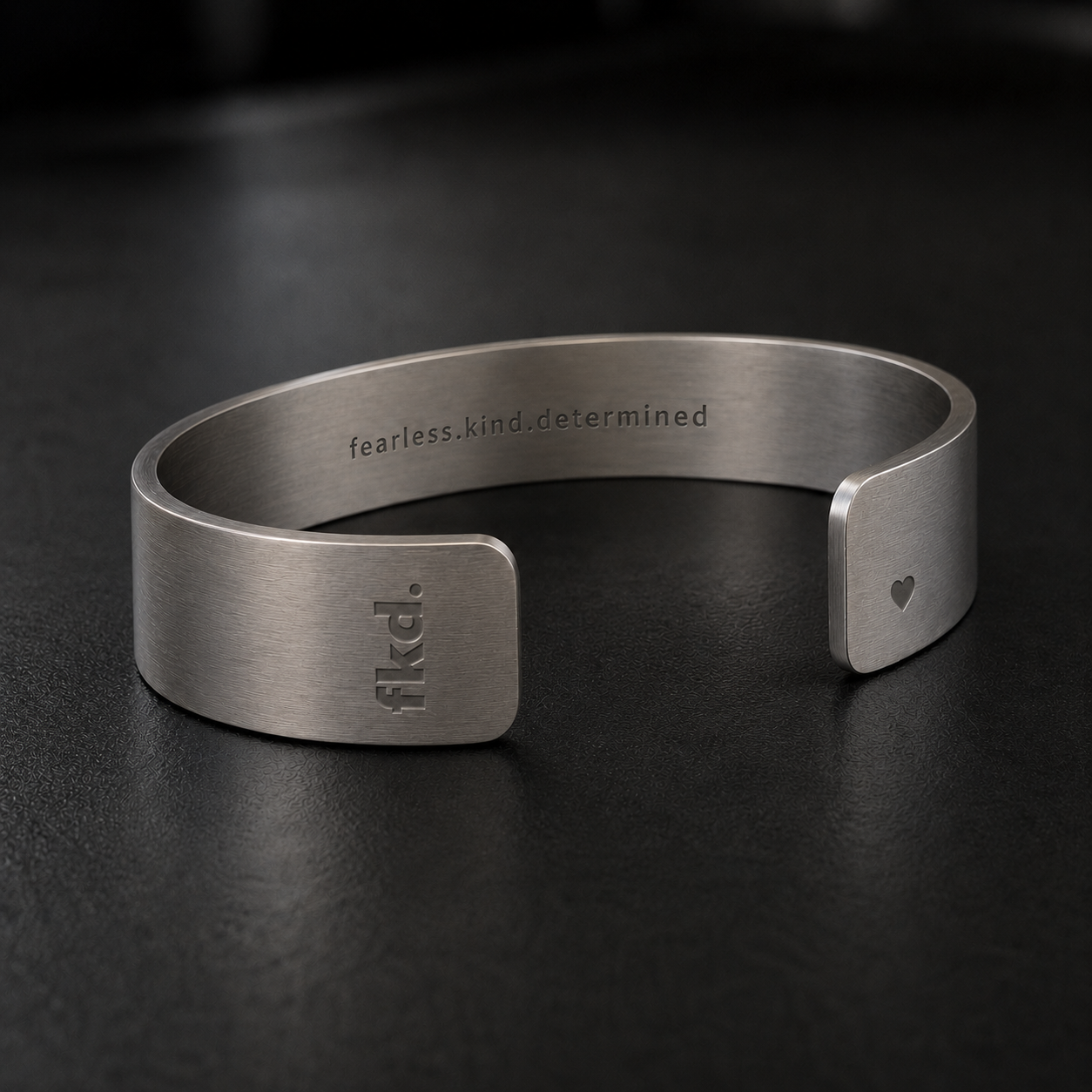 fkd Core 1.0 studio shot — fearless. kind. determined. engraving detail